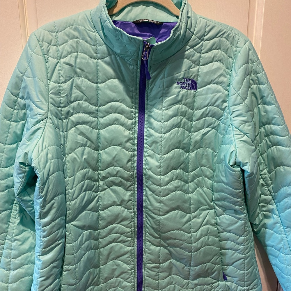The North Face Women's Light weight mint green and purple Quilted Puffer Jacket